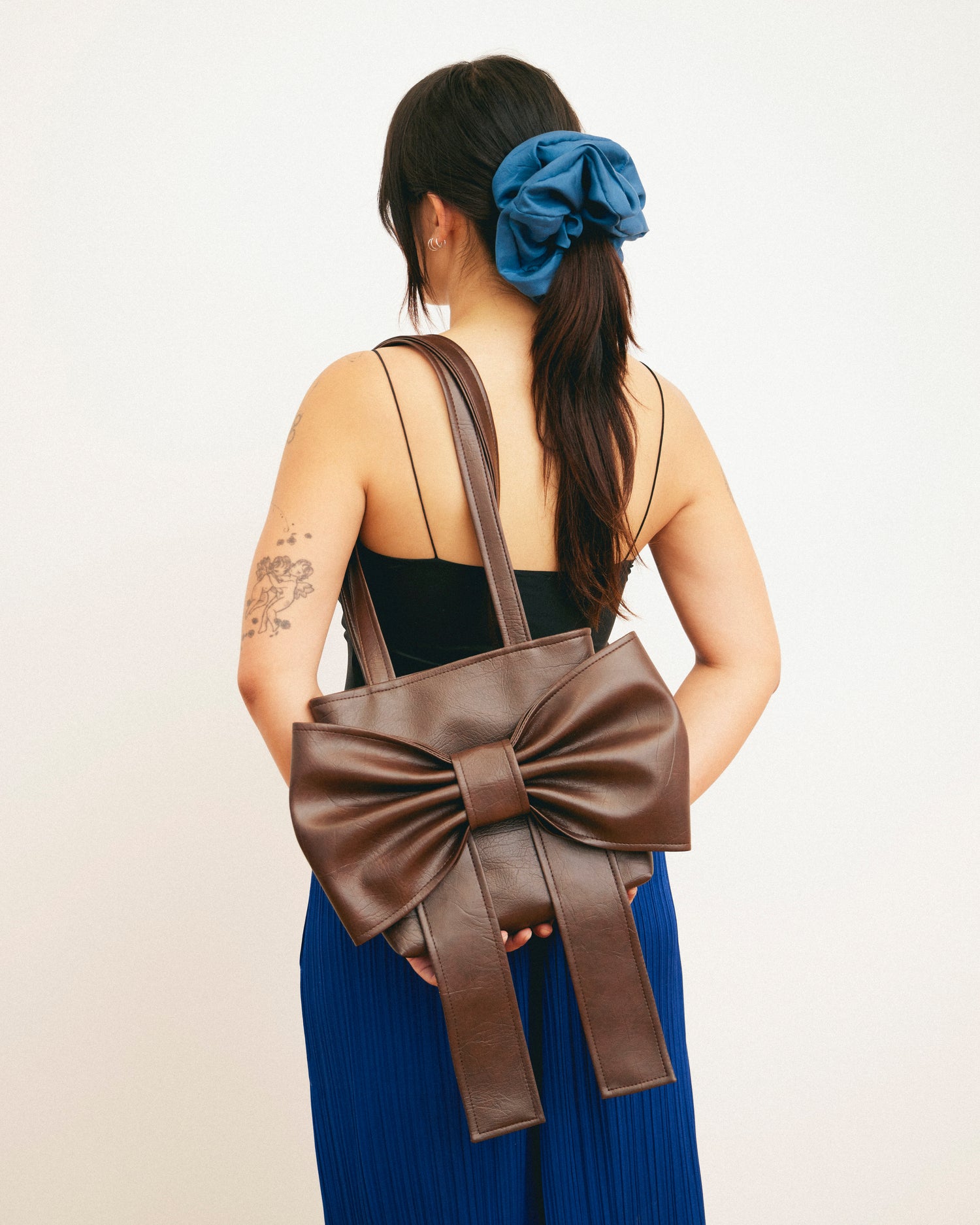 Caitlin Snell | Market Bag | Leather | Vinyl | Bow Bag | Handmade | Ethical Fashion | Sustainable Fashion | Gift | New Zealand Made | Small Business | Natural Fibre | Durable | Chic | Hair Accessory | Slow Fashion 