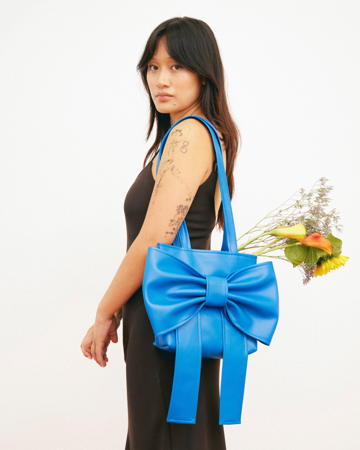 Caitlin Snell | Market Bag | Blue Bag | Leather | Vinyl | Bow Bag | Handmade | Ethical Fashion | Sustainable Fashion | Gift | New Zealand Made | Small Business | Natural Fibre | Durable | Chic | Hair Accessory | Slow Fashion 