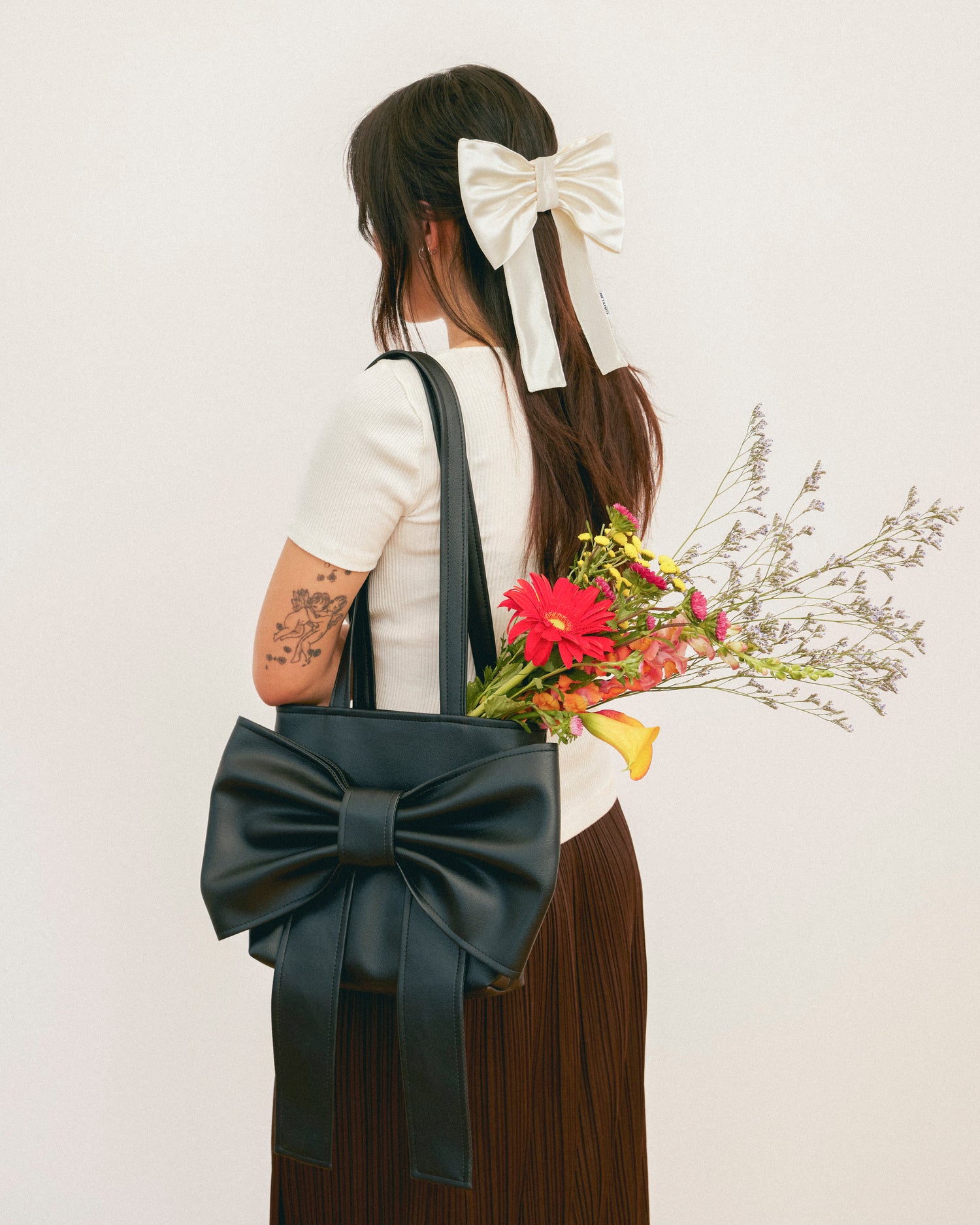Caitlin Snell | Market Bag |  Leather | Vinyl | Bow Bag | Handmade | Ethical Fashion | Sustainable Fashion | Gift | New Zealand Made | Small Business | Natural Fibre | Durable | Chic | Hair Accessory | Slow Fashion 